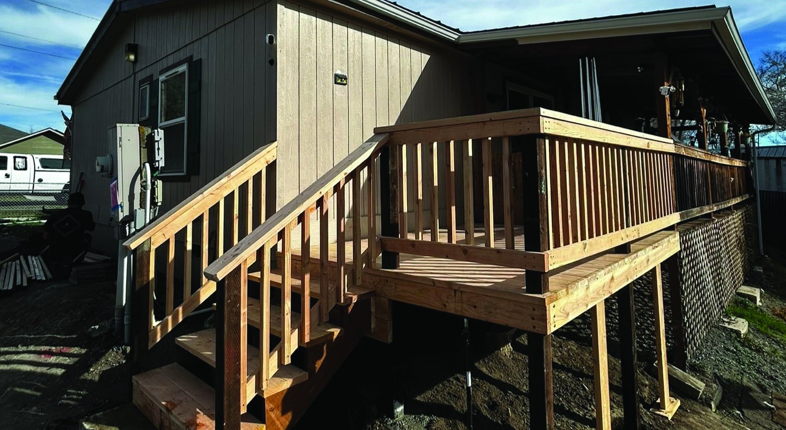A new deck and stairway built by KB Premier Construction in Klamath Falls