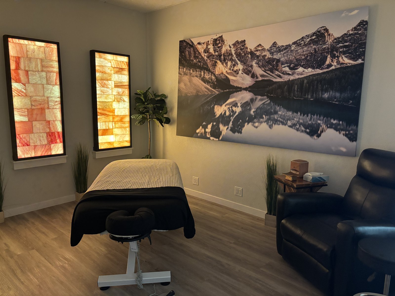 Massage therapy at Almond Aesthetic Medicine — featuring a signature Himalayan salt-wall sanctuary room