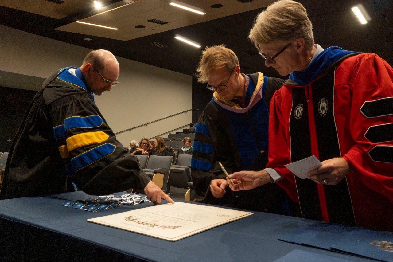 Bradley R. Newcomer, Pake Melland, and Christopher J. Syrnyk at Phi Kappa Phi Installation
