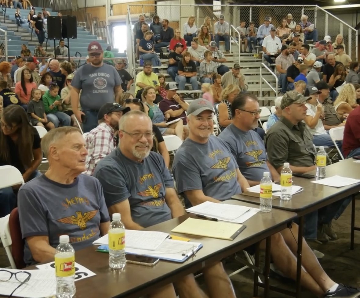 Buyers fill the front tables and the grandstand for the 92nd Klamath County Rotary 4-H & FFA Livestock Auction at the Klamath County Fairgrounds.