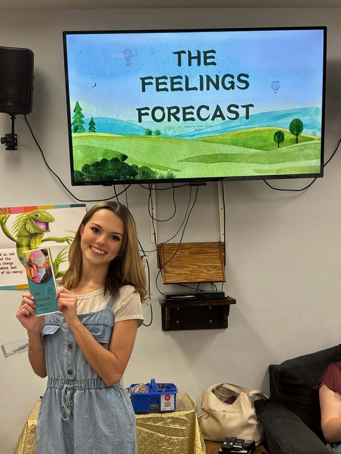 Tenaya Cherrick with The Feelings Forecast, the emotional-wellness guide she wrote and illustrated for her Girl Scout Gold Award project.