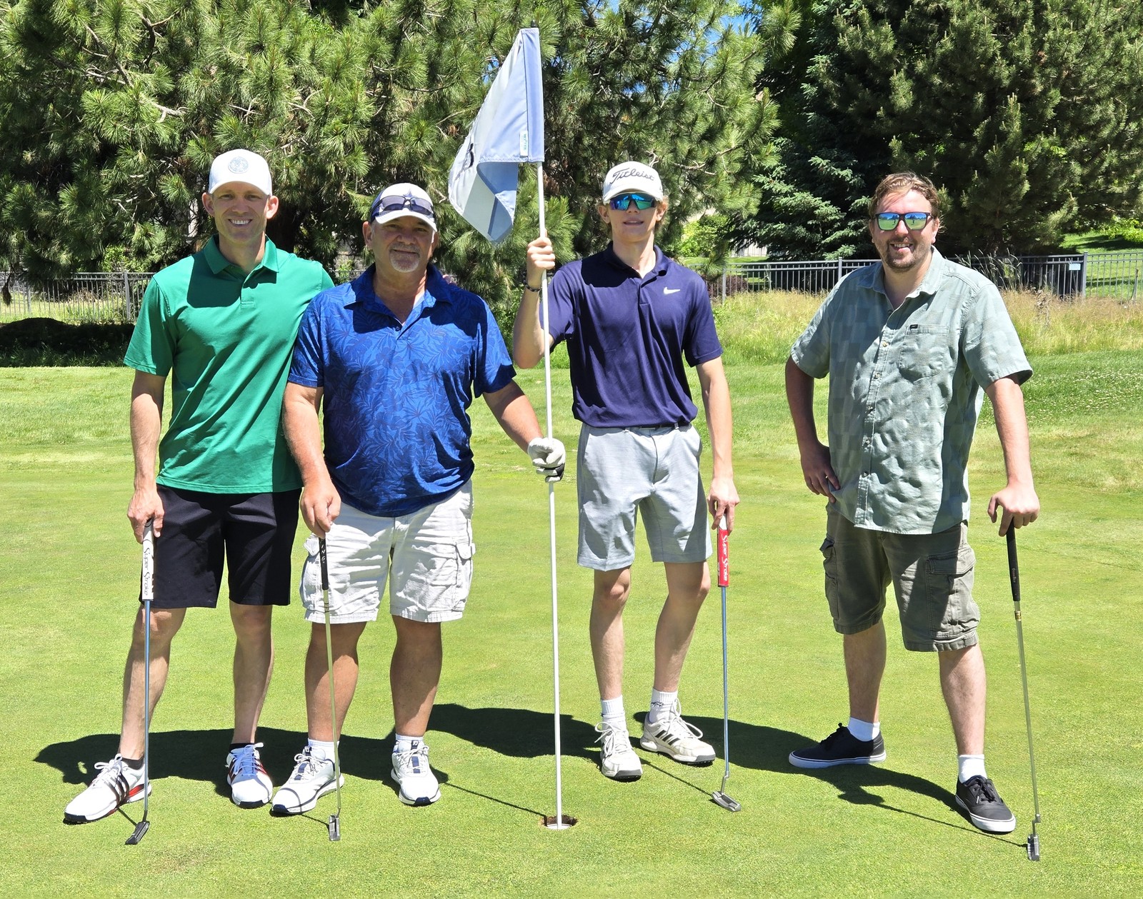 A foursome at Shield Crest Golf Club during the YMCA of Klamath Falls community golf tournament