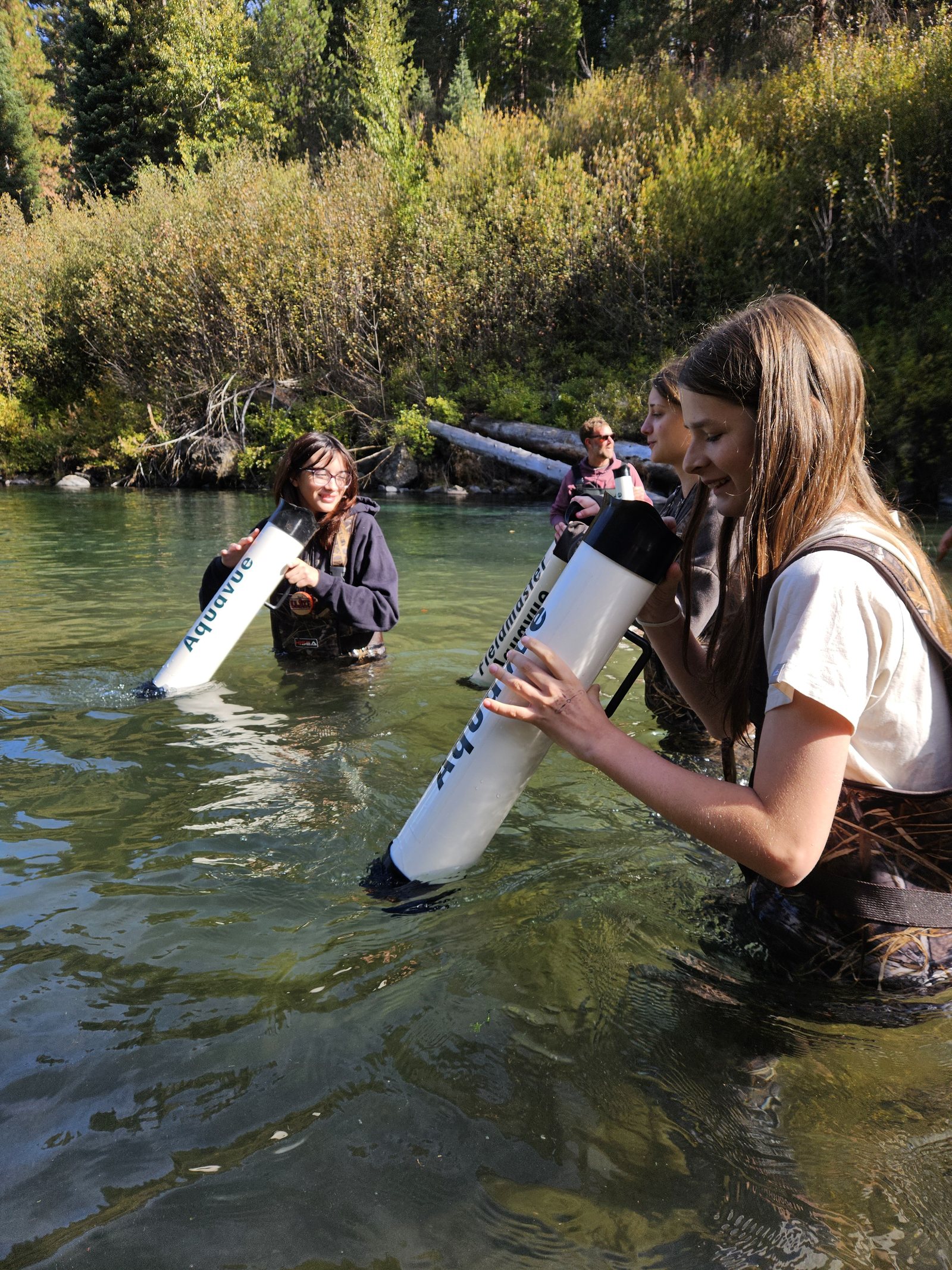 Campers taking a look underwater with our new viewers