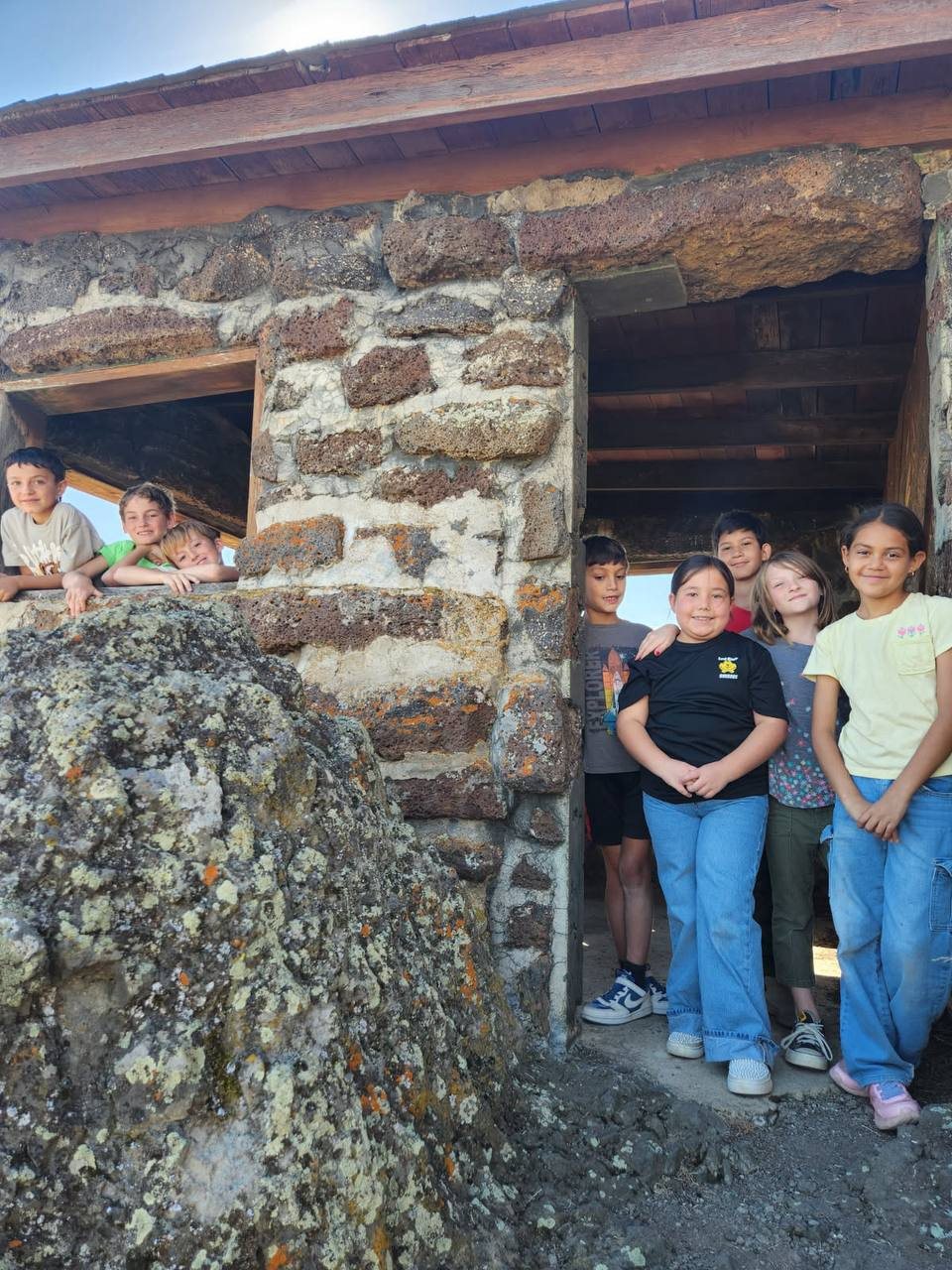 Students celebrate making it to the Sheepy Ridge lookout